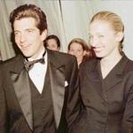 NYK04:KENNEDY-AWARD:NEW YORK,4MAR97 - John F. Kennedy Jr. and his wife Carolyn Bessette stop for photographers after Kennedy presented actor Robert De Niro with the Municipal Art Society of New York's Jacquiline Kennedy Onassis Medal at a gala dinner in New York, March 4. De Niro was honored for his outstanding contribution to the preservation of New York City's neighborhoods. ms/Photo by Mike Segar REUTERS